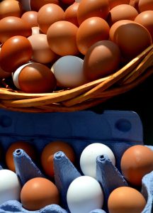 Eggs in basket and carton